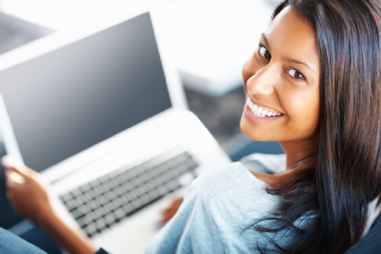 Attractive woman working on her laptop