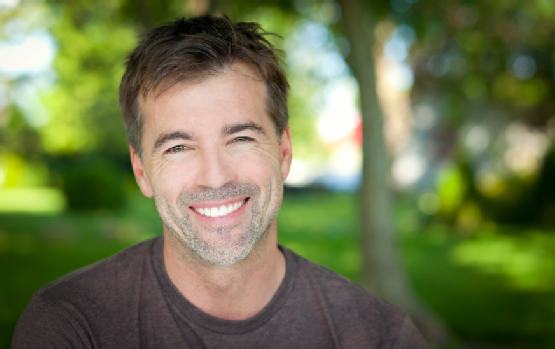 Portrait Of A Man Smiling At The Camera