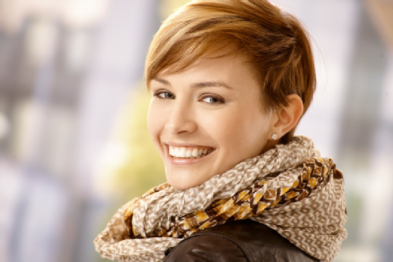 Happy young woman looking back