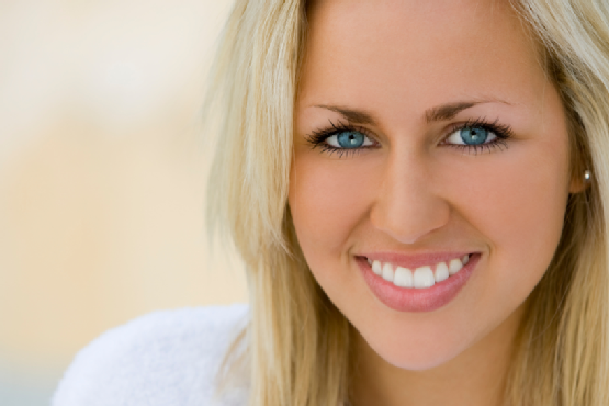 Portrait of A Beautifully Healthy Smiling Young Blond Woman